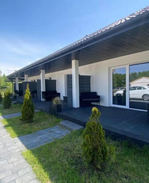 Domki Black Pearl basen sauna jacuzzi Mielno