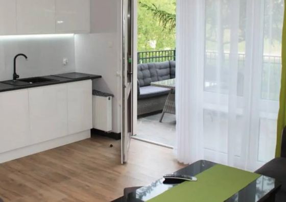 Karla- apartamenty i pokoje w Dębkach