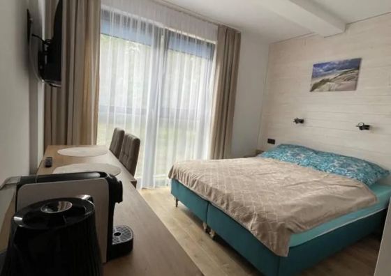 Riviera Apartamenty i Pokoje Poddąbie