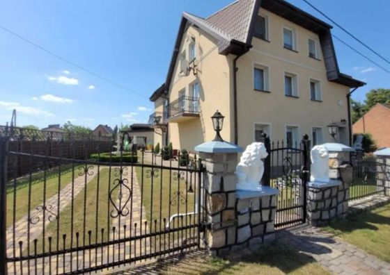 Pod Lwem Pokoje Gościnne i Domki Letniskowe Łeba