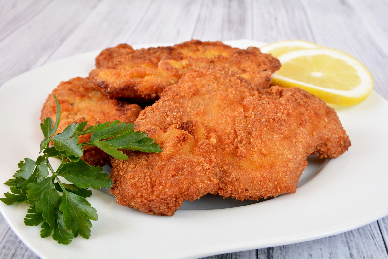 Gesunde Schweinekoteletts aus dem Ofen: Knusprig ohne Frittieren