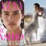 Naturalna Zoe Kravitz bawi się z wilkami w nowej sesji