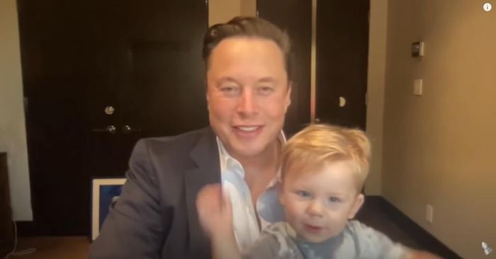 Elon Musk with his son.  Screenshot from YT