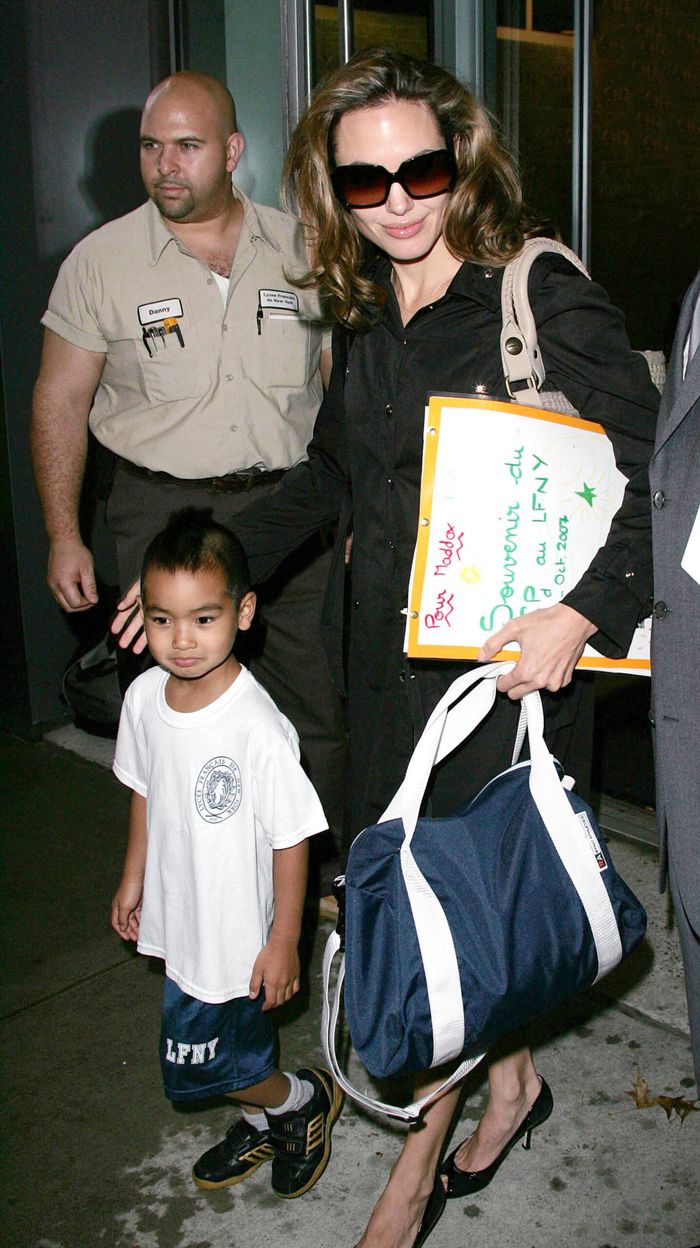Angelina Jolie collects Maddox from school - New York