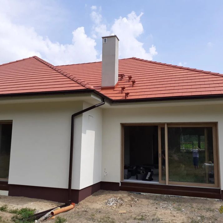 Daszewice - dom z dachem kopertowym - realizacja budowy domu