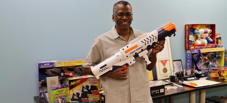 Lonnie Johnson with a commercial version of his invention
