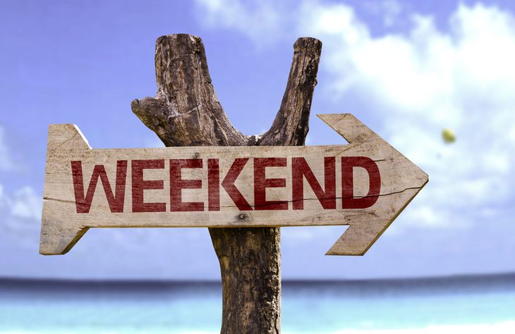 Weekend wooden sign with a beach