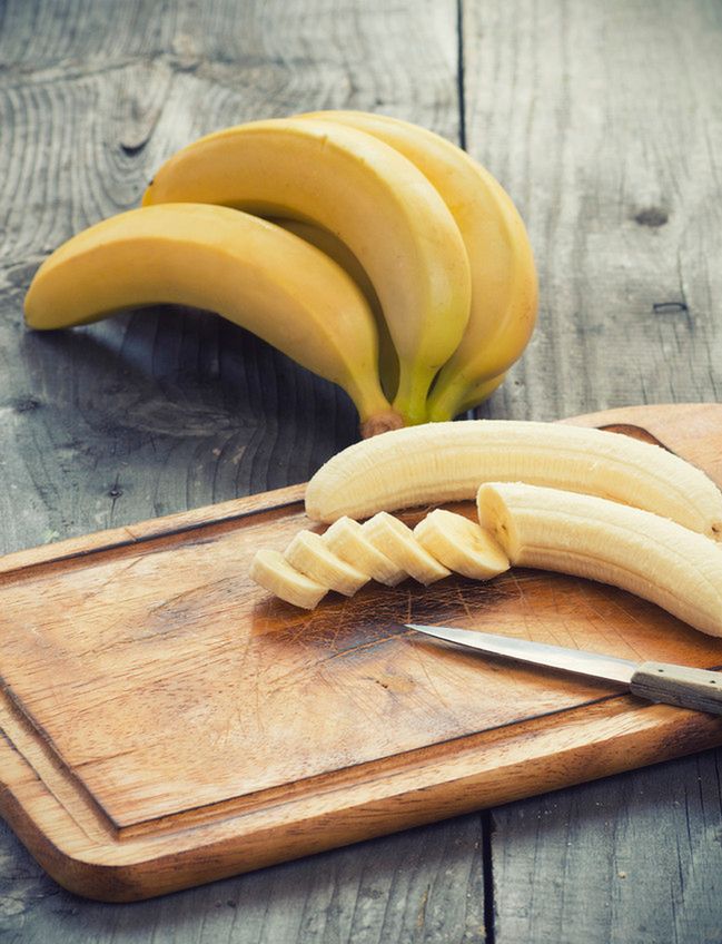 Fresh bananas on wooden background.Selective focus