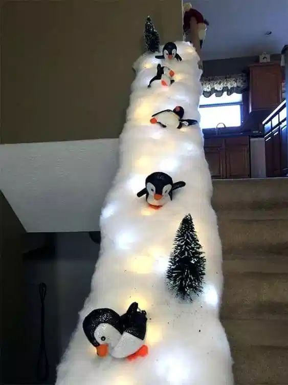 penguins on slide christmas decoration