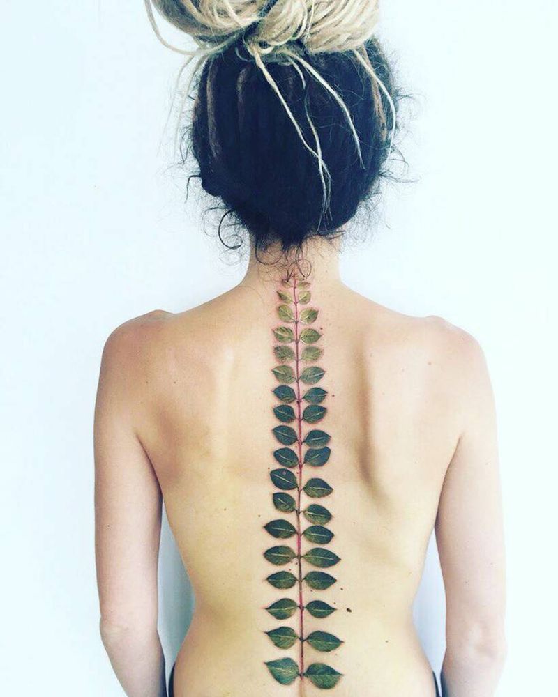 Looking for spine tattoo ideas that aren't the typical flowers or dragons.  : r/TattooDesigns