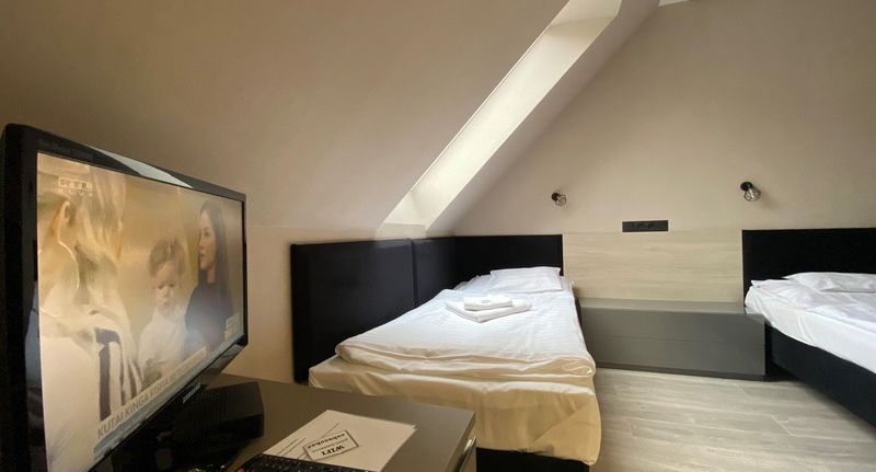 Studio Apartman pro 1 os. s 1 ložnicí v podkroví - Sóház Panzió és Apartmanház Szolnok ****, foto 1