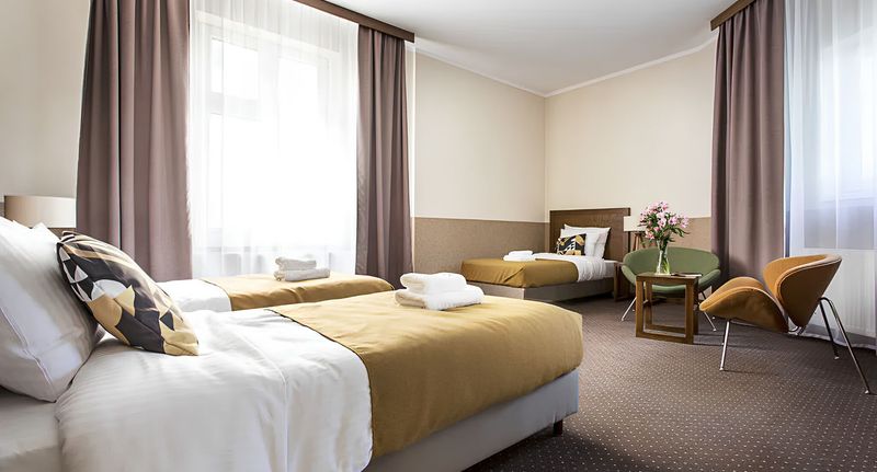 Pokoj s koupelnou pro 3 os. s výhledem do zahrady - Zulian Aparthotel by Artery Hotels Kraków, foto 1