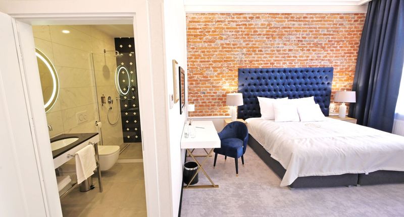Deluxe Pokoj pro 4 os. na poschodí - Aparthotel Szewska 22 Boutique Kraków, foto 1