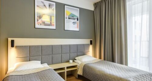 Twin Pokoj pro 2 os. na poschodí - City Comfort Aparthotel Warszawa, foto 1
