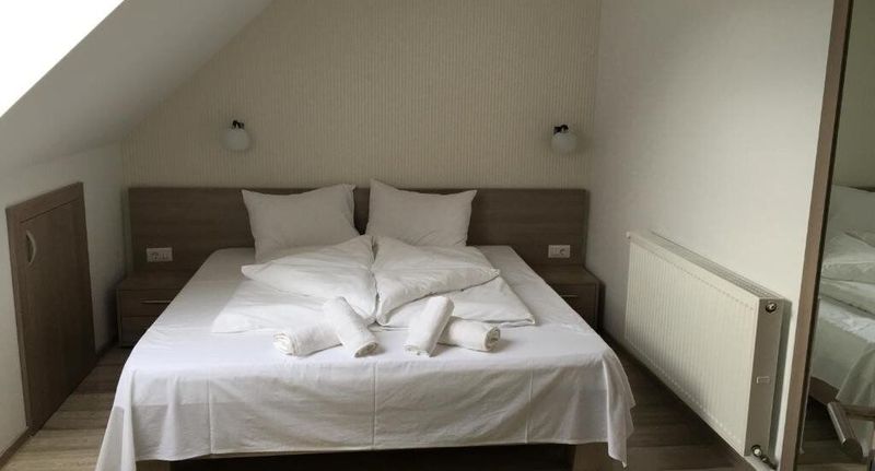Manzárd Apartman pro 4 os. se 2 ložnicemi (s možností přistýlky) - Pensiunea Amso Residence Sibiu, foto 1