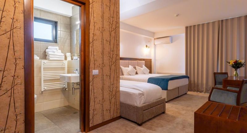 Suita s manželskou postelí s 1 ložnicí na poschodí (s možností přistýlky) - Hotel Buchenland Gura Humorului, foto 1
