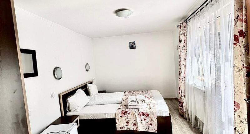 Pokoj s manželskou postelí - Pensiunea Inima Bucegilor Moieciu de Sus, foto 1