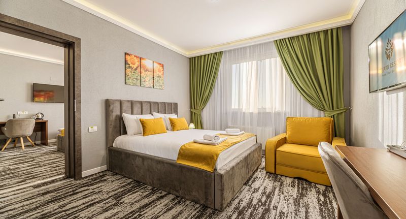 Family Suita pro 4 os. s 1 ložnicí - Hotel Stejarii Resort Ineu, foto 1