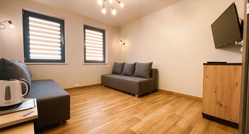 Pokoj pro 4 os. s výhledem na moře na poschodí - Willa Pod Czwórką Rewa, foto 1