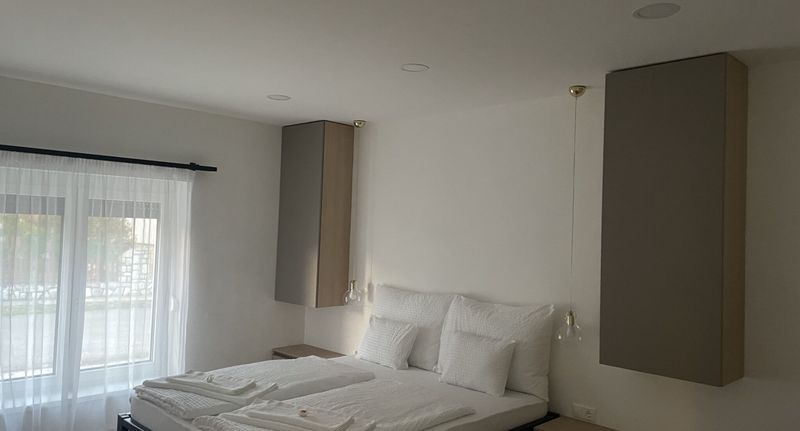 Rodinný Pokoj bezbariérový s manželskou postelí (s možností přistýlky) - WBR Vendégház Villány, foto 1