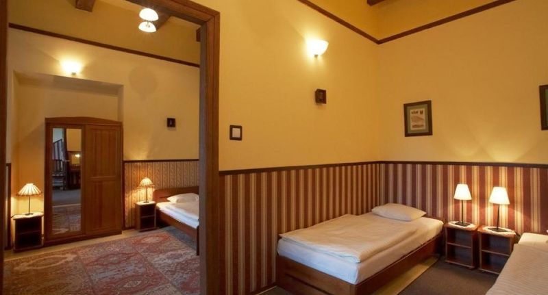 Pokoj s koupelnou pro 4 os. s výhledem do zahrady - Globtroter Guest House Kraków, foto 1