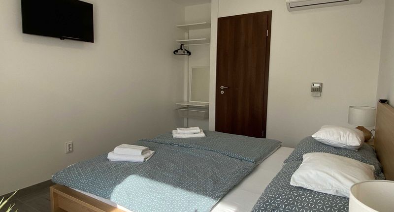 Standard Pokoj s klimatizací s manželskou postelí - Sulyom Panzió Tiszafüred, foto 1