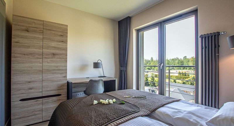 Apartman s balkónem s koupelnou pro 4 os. se 2 ložnicemi - Apartamenty Szmaragdowa 10 Mielno, foto 1