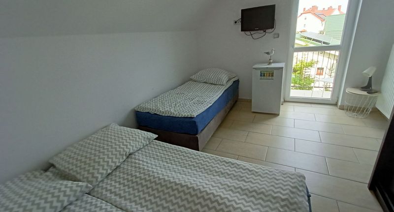 Pokoj s balkónem s koupelnou pro 3 os. - Willa Albatros Mielno, foto 4