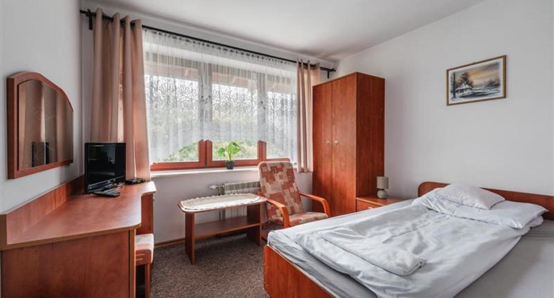 Pokoj s manželskou postelí s výhledem na hory - Ośrodek wypoczynkowy "Noclegi u Aguni" Krynica-Zdrój, foto 1
