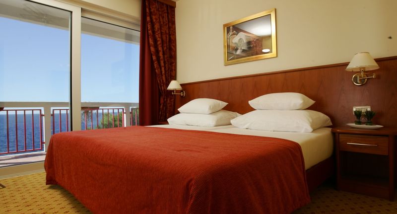 Suita s balkónem s manželskou postelí s 1 ložnicí s výhledem na moře - Hotel Zora Primošten, foto 1