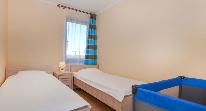 Apartman tV s plochou obrazovkou s terasou pro 4 os. se 2 ložnicemi (s možností přistýlky) - Apartamenty Tęczowe Darłówko, foto 1