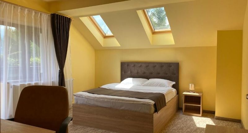 Apartman pro 4 os. se 2 ložnicemi s výhledem do dvora s výhledem na město - Pensiunea Bellestay Brașov, foto 1