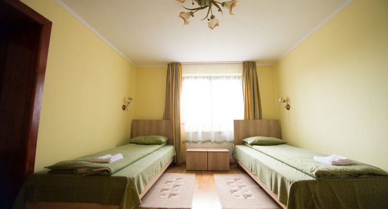 Suita pro 4 os. se 2 ložnicemi na přízemí - Casa Paveios Oradea, foto 1