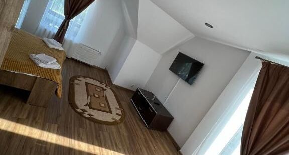 Apartman pro 4 os. se 2 ložnicemi s výhledem na les s výhledem na řeku (s možností přistýlky) - Vila Vibrant Bran, foto 1