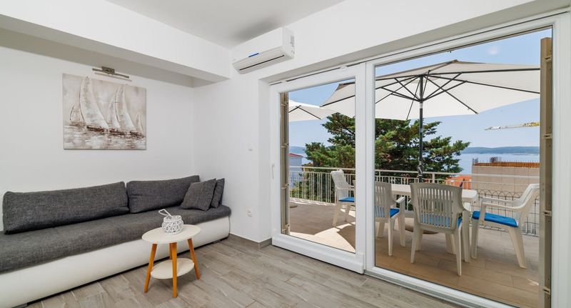 Apartman s balkónem pro 4 os. se 2 ložnicemi s částečným výhledem na moře - Apartment Jusic Selce, foto 1