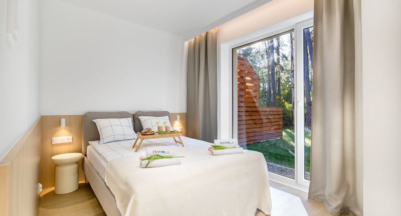 Apartman pro 4 os. se 2 ložnicemi s výhledem na les přízemní - Apartamenty Piamola - Stegna Park 4E, foto 1