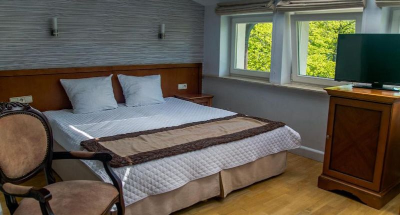 Pokoj s manželskou postelí s výhledem do zahrady - Hotel Apollo Darłówko, foto 1