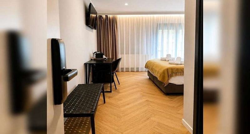 Pokoj pro 4 os. - Novo Studio Hotel Râmnicu Vâlcea, foto 1