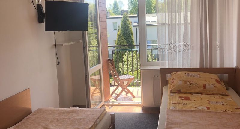 Pokoj pro 2 os. s výhledem do zahrady na poschodí - Pokoje U Henryki Kołobrzeg, foto 1