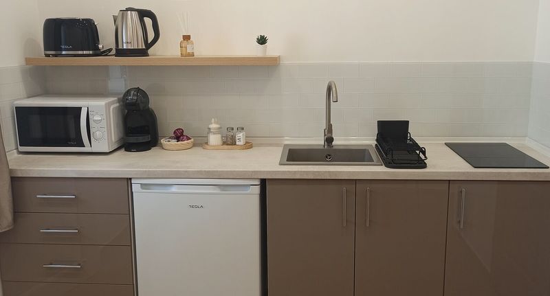 Rodinný Apartman s manželskou postelí s 1 ložnicí na přízemí (s možností přistýlky) - B30 Apartmanok Eger, foto 1