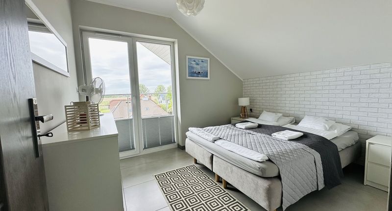 Komfort Apartman pro 4 os. se 2 ložnicemi s výhledem na moře - Willa Dobryłko II Rewa, foto 1