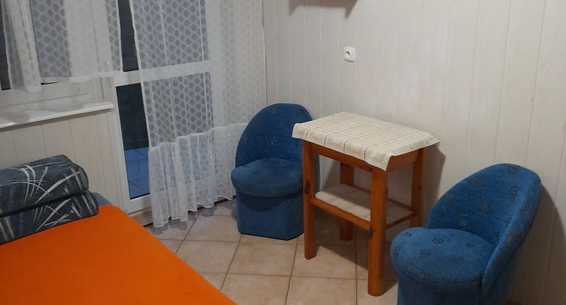 Pokoj s manželskou postelí s výhledem do zahrady - Willa Radość Krynica Morska, foto 1