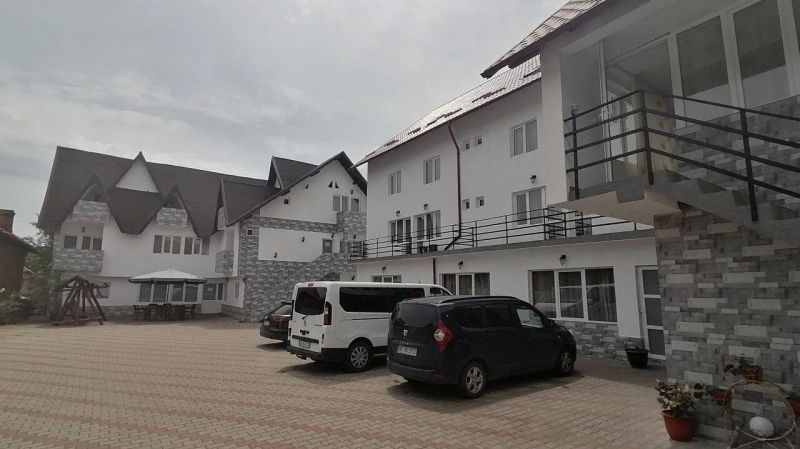 Pensiunea Iuliana Căpățânenii Pământeni - foto 1