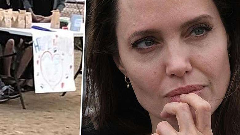 Angelina Jolie dziećmi sprzedaje psie chrupki w parku