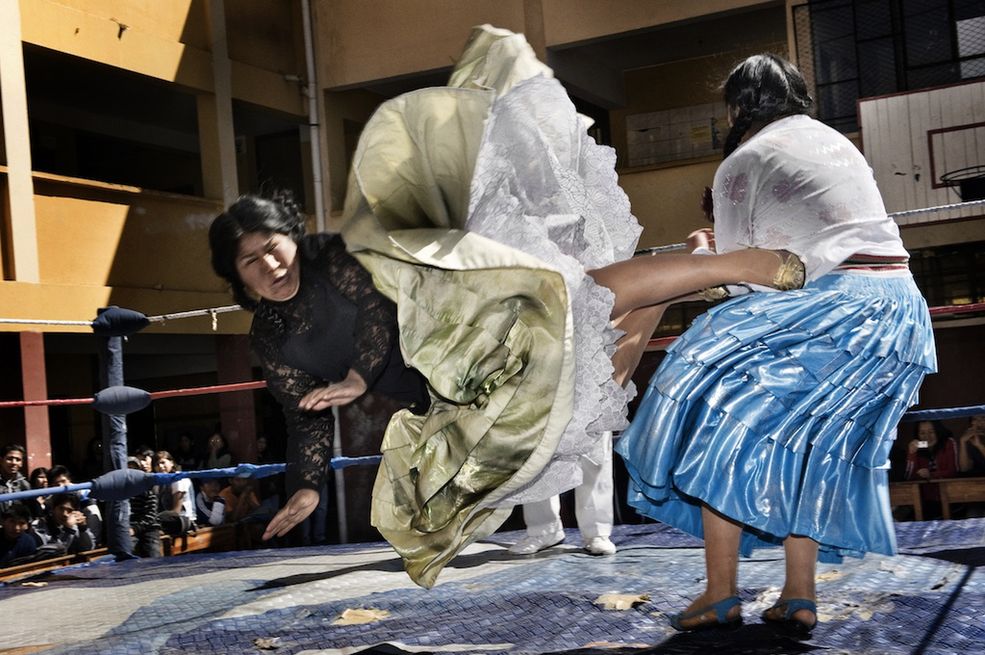 Fot. Daniele Tamagnijpg / Włochy 2nd Prize Arts and Entertainment Stories
Daniele Tamagni, Italy
The Flying Cholitas, Bolivia:
Lucha libre (Bolivian wrestling) is one of the most popular sports in the country. Women wrestlers are known as cholitas and have in the last ten years become popular in the sport. Here, Carmen Rosa and Yulia la Pacena perform in a benefit show to raise money for the bathrooms of a school in La Paz, Bolivia, 26 June.