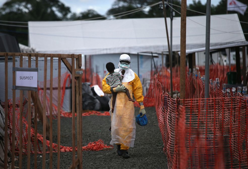 @ John Moore / „Kryzys związany z wirusem Ebola w stolicy Liberii” / Nagroda L’Iris d’Or, tytuł Fotografa Roku