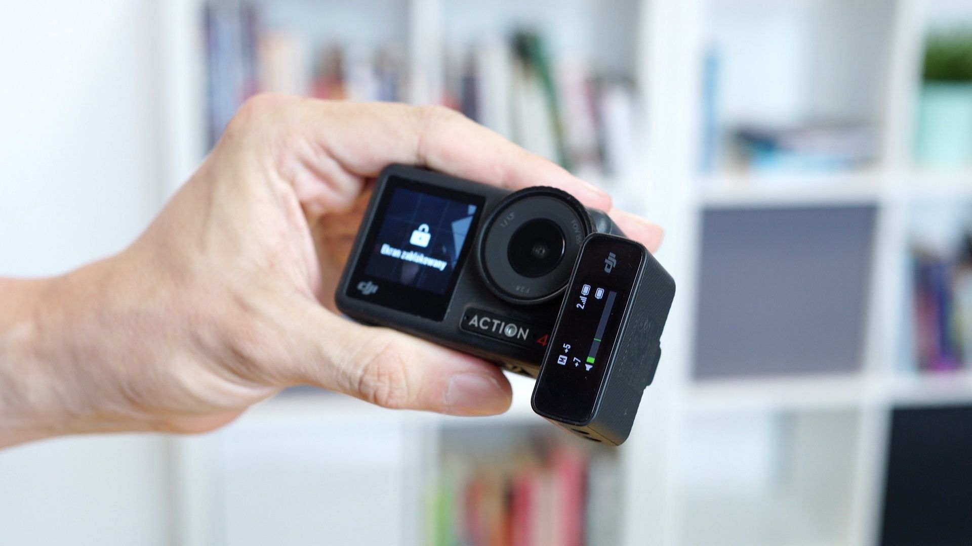Dji Osmo Action 4 - z zamontowanym odbiornikiem systemu Dji Mic
