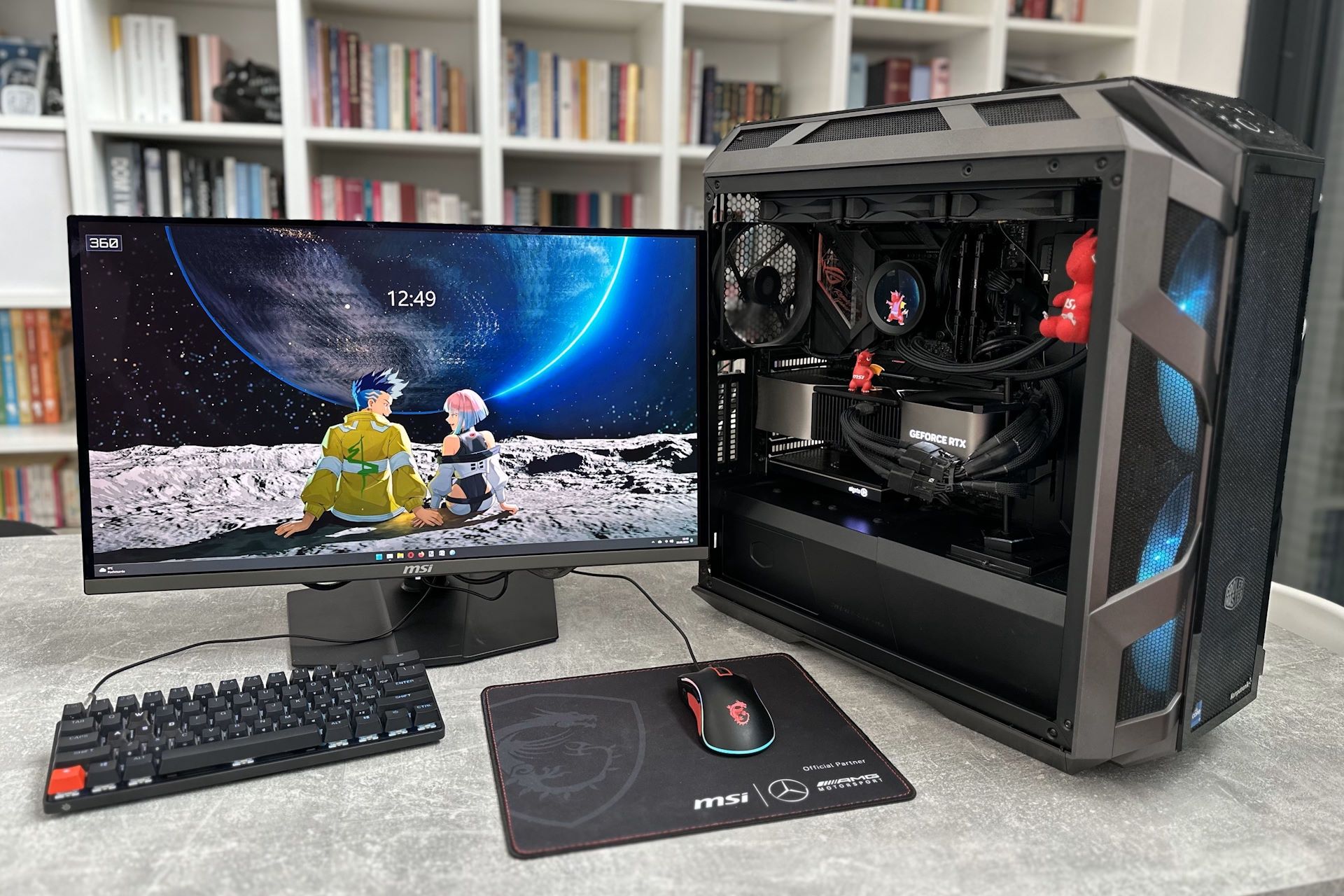 MSI MPG 271QRX QD-OLED - obok komputera