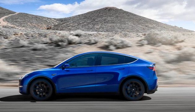Tesla Model Y bok